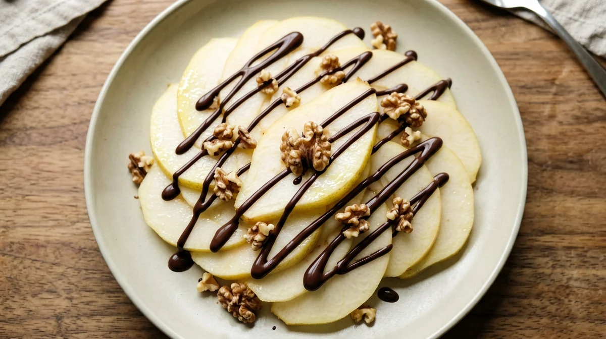 Pear carpaccio with dark chocolate and walnuts