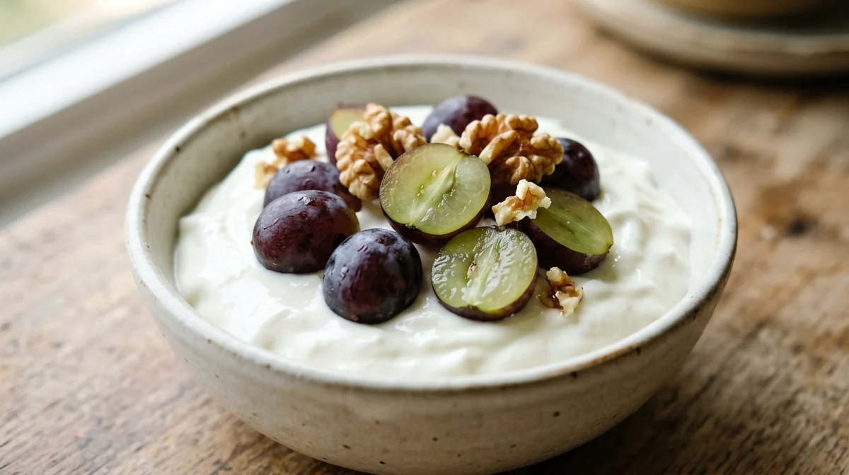Greek yogurt with Concord-type grapes and walnuts