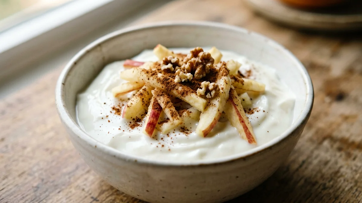Plain yogurt with grated apple and cinnamon